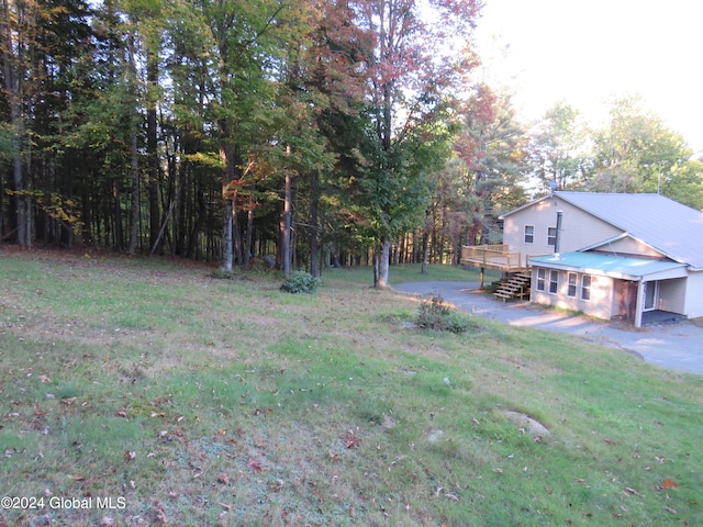 view of yard with a deck