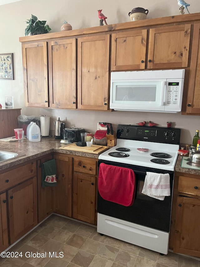 kitchen featuring white appliances