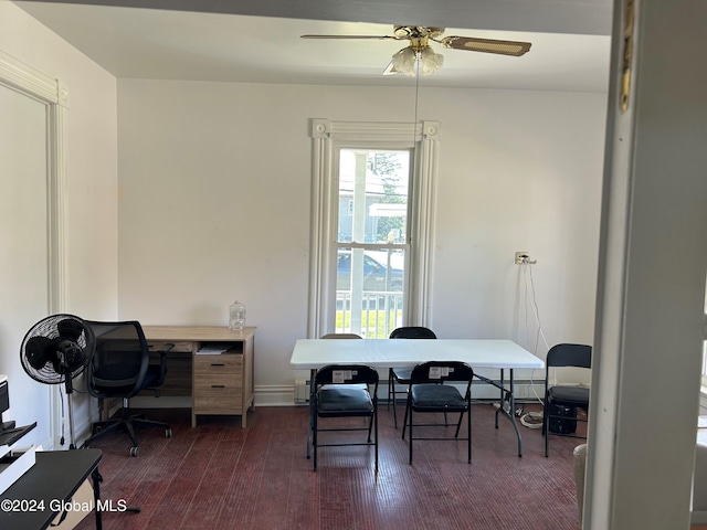 office area with dark hardwood / wood-style flooring and ceiling fan