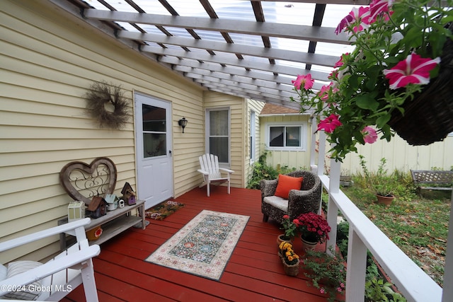 wooden deck with a pergola