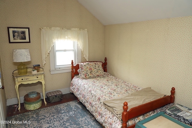 bedroom with vaulted ceiling