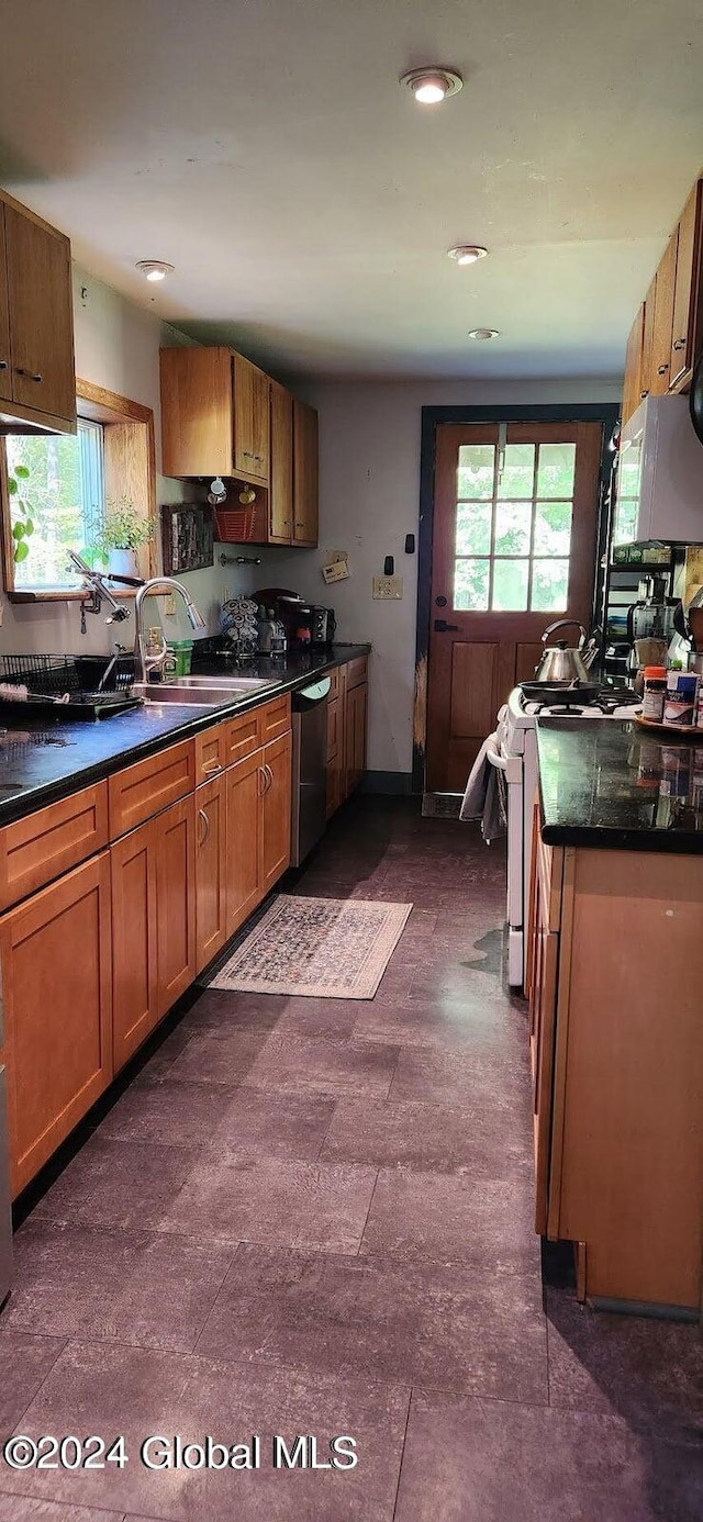 kitchen with sink and white appliances