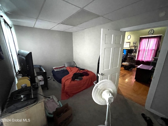 bedroom with a drop ceiling