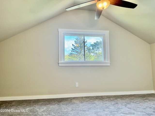 bonus room with baseboards, a ceiling fan, carpet flooring, and vaulted ceiling