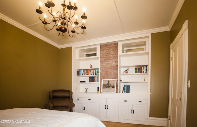 bedroom featuring an inviting chandelier, hardwood / wood-style flooring, and crown molding