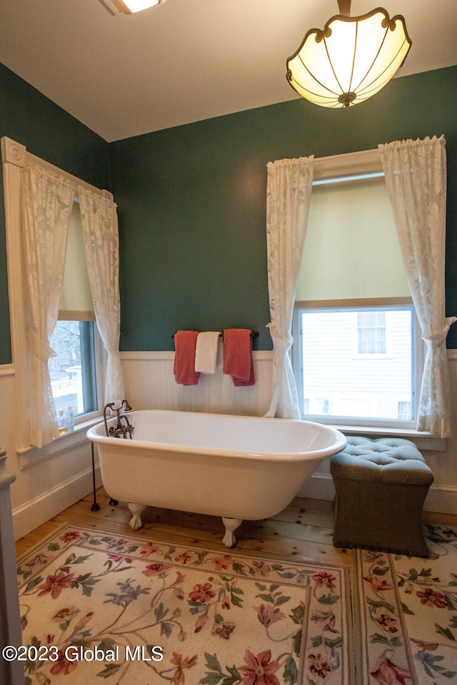 bathroom with a washtub