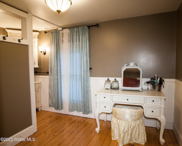 bathroom featuring wood-type flooring and vanity