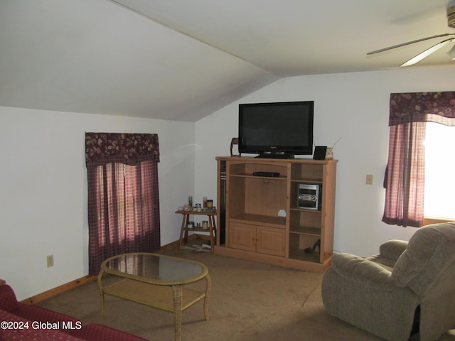 carpeted living room with lofted ceiling and ceiling fan