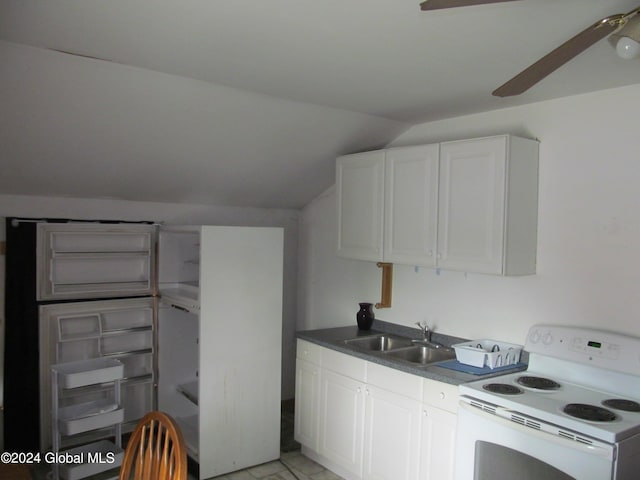 kitchen with white cabinets, vaulted ceiling, white range with electric stovetop, and sink