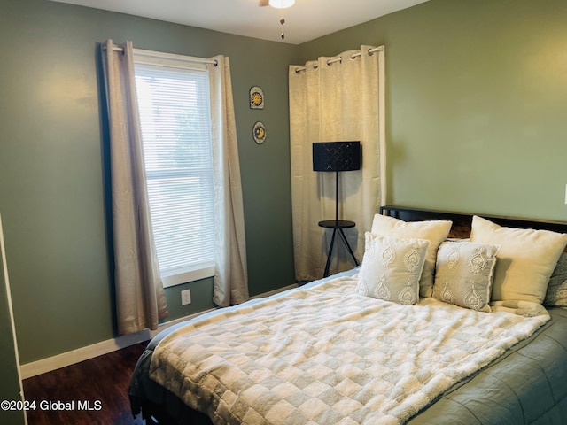 bedroom featuring wood-type flooring