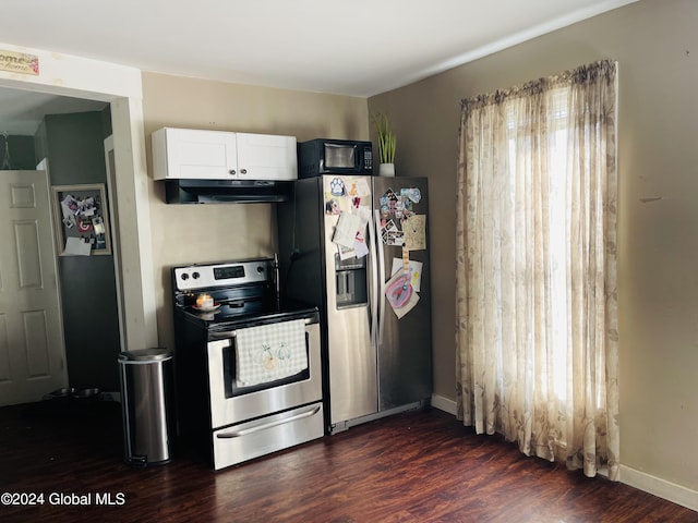 kitchen with white cabinets, appliances with stainless steel finishes, dark hardwood / wood-style floors, and range hood