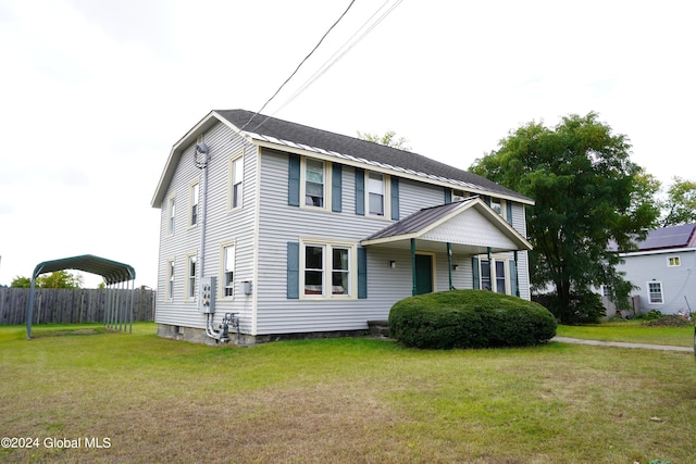 view of front of property with a front lawn