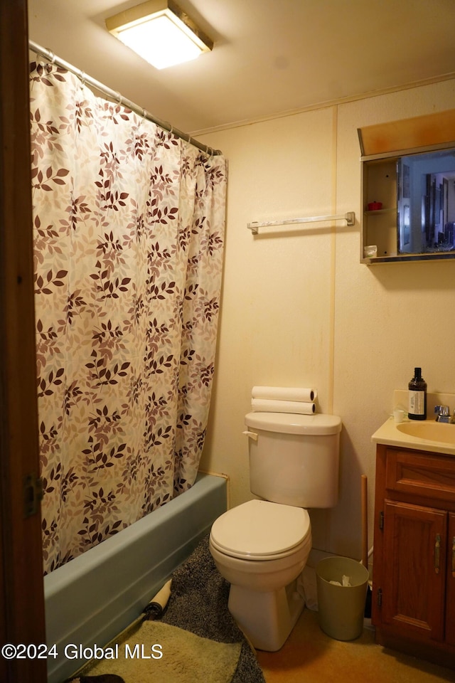 full bathroom with shower / bath combo, vanity, and toilet