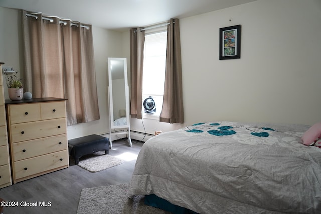 bedroom with hardwood / wood-style floors