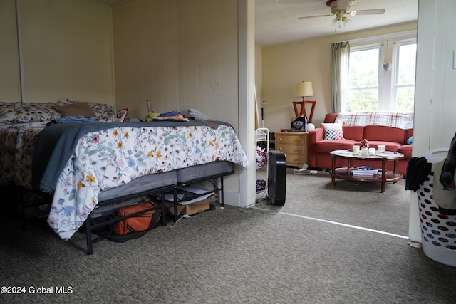 bedroom featuring ceiling fan and carpet flooring