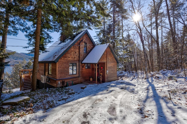 rustic home featuring a chimney