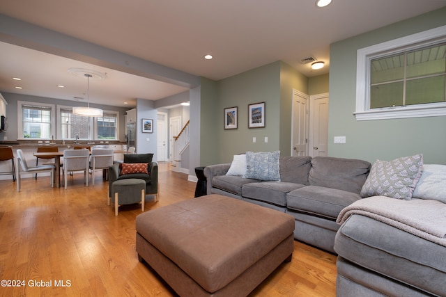 living room featuring light wood-type flooring