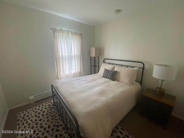 bedroom featuring baseboard heating