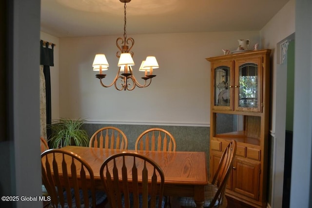 dining room with a chandelier