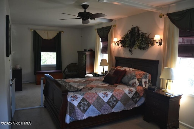 bedroom featuring carpet, ceiling fan, and baseboards