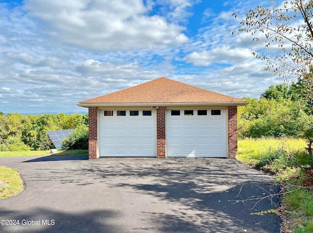 garage featuring solar panels