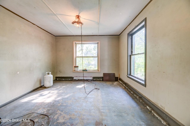 unfurnished dining area with concrete flooring