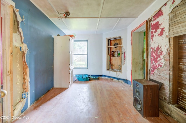 empty room with wood finished floors
