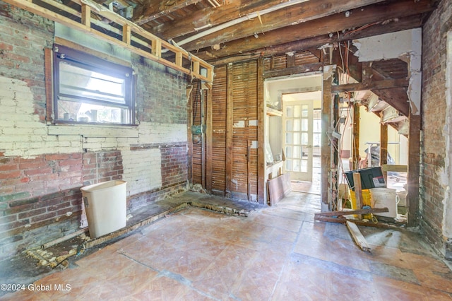 interior space with brick wall
