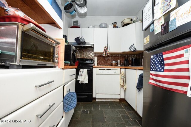kitchen featuring refrigerator, black electric range, dishwasher, stainless steel microwave, and white cabinetry
