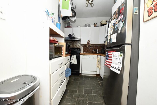 kitchen featuring white cabinets, under cabinet range hood, appliances with stainless steel finishes, and tasteful backsplash