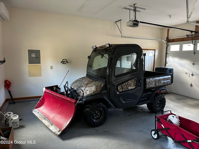 garage with a garage door opener and electric panel