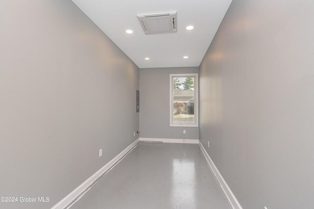 corridor featuring concrete floors