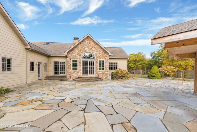 rear view of property with a patio