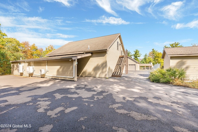 view of property exterior with a garage