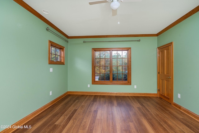 unfurnished room with dark hardwood / wood-style floors, crown molding, and ceiling fan