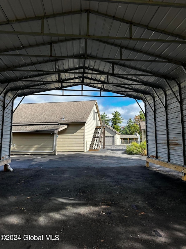 garage with a carport