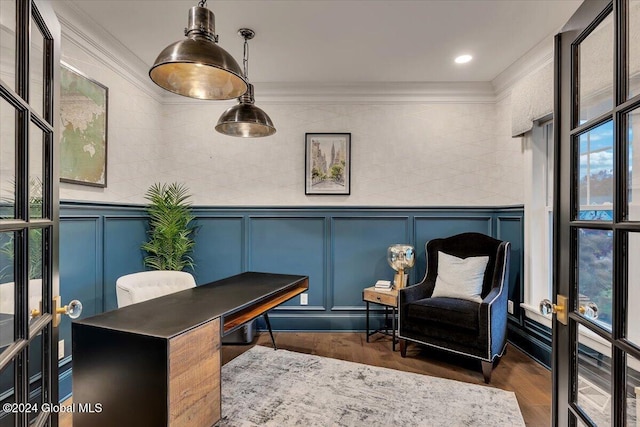 office area featuring dark wood-type flooring, crown molding, and a decorative wall