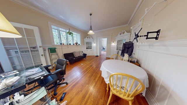 office with crown molding and hardwood / wood-style floors