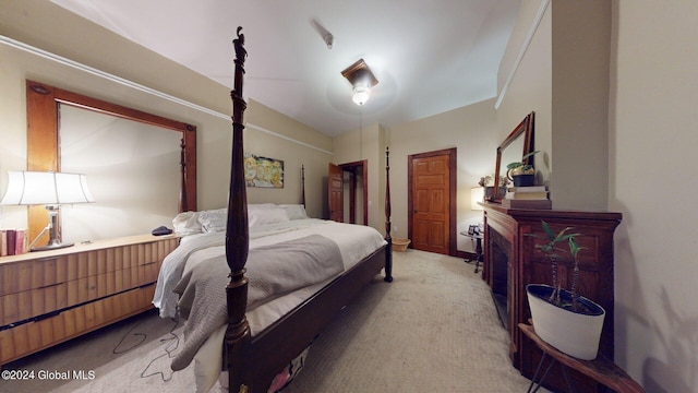 bedroom featuring light colored carpet