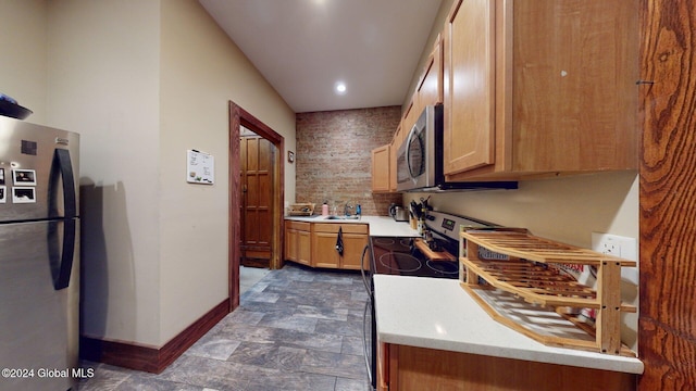 kitchen featuring stainless steel appliances and sink