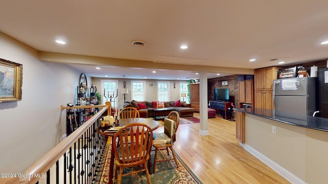 dining area featuring light hardwood / wood-style floors