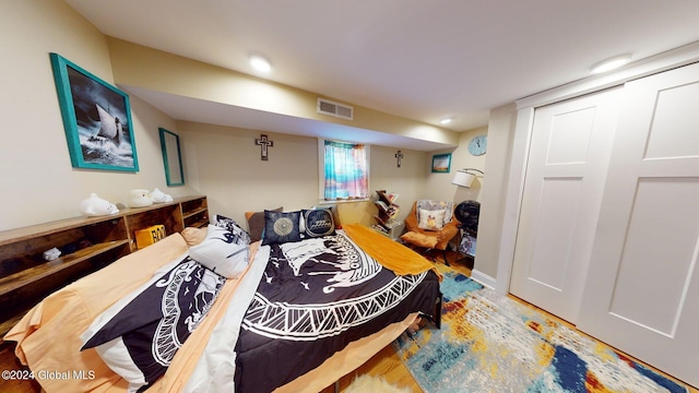 bedroom with wood-type flooring