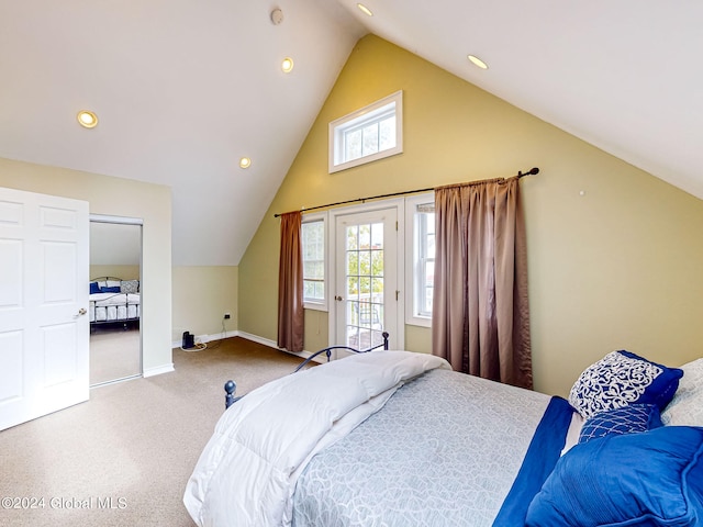 bedroom with access to exterior, vaulted ceiling, and carpet flooring