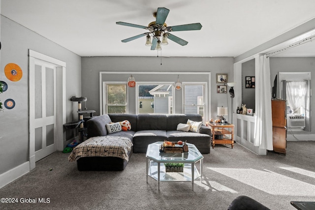 carpeted living room with ceiling fan and cooling unit