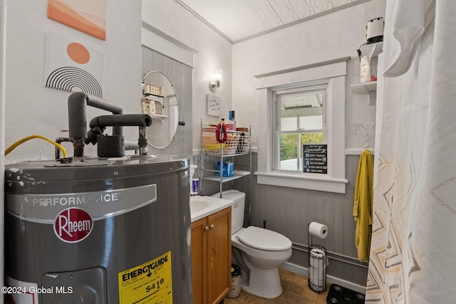 bathroom featuring tile patterned flooring, water heater, vanity, and toilet