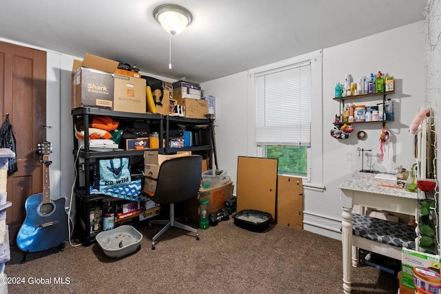 carpeted office featuring a baseboard radiator