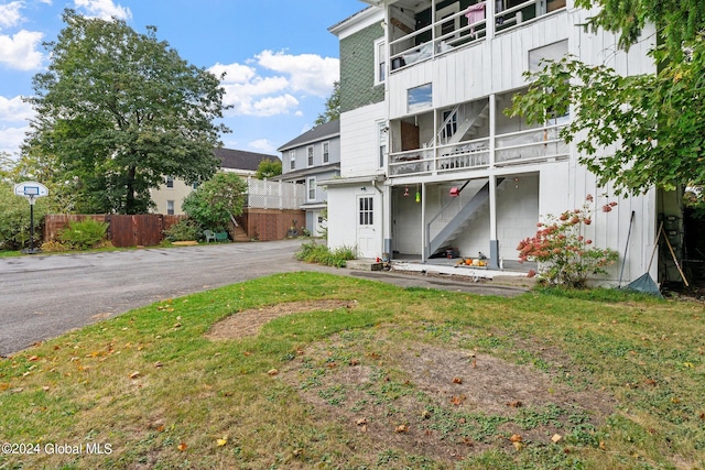 rear view of house with a balcony