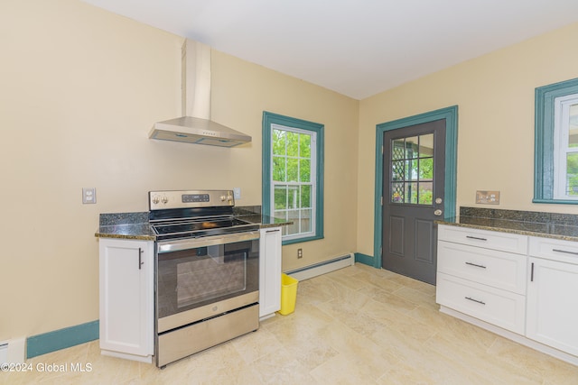 kitchen with exhaust hood, white cabinets, a baseboard heating unit, and stainless steel electric range