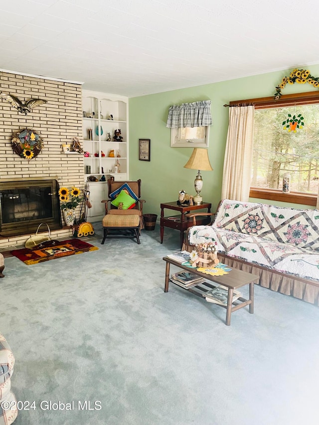 carpeted living room featuring a fireplace