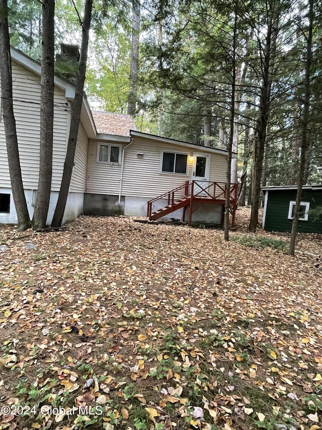 21 Pine Rd, Lake Luzerne, NY 12846 - back of house featuring crawl space